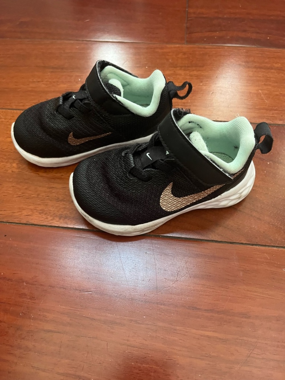 Nike Kids Black Sneakers with Mint Lining and Rose Gold Swoosh